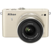 Nikon 1 J3 beige + 10-30mm VR Nikon 1 J3 beige + 10-30mm VR