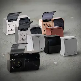 Doktorvolt Aufputzsteckdose IP44 französisch mit Klappdeckel Grau/Weiß