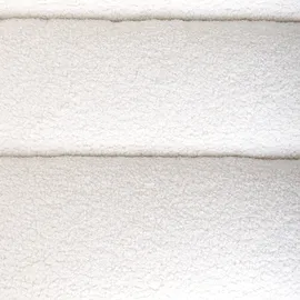 Beliani Sessel LEKNES Bouclé 72 x 71 x 70 cm Cremeweiß