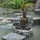 ECD Germany Buddha Figur Sitzend 50cm hoch, aus wetterfestem Polyresin Bronze, Feng Shui, Statue als Dekoration Skulpturen & Garten Gartenfigur