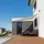 WINDHAGER Sonnensegel ELBA, Dreieck, Grau, dreieckig, Beschichtetes HDPE-Gewebe, 3,6 x 3,6 m, 135 g/m2, Sonnenschutz für Terrasse, Balkon oder Pool, inklusiv befestigungsseil, reißfest, waschbar