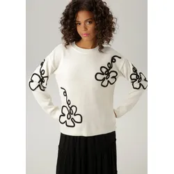 Strickpullover, mit extravaganten Blüten-Applikationen, Gr. 40, wollweiß-schwarz, , 23331469-40