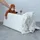 Intirilife Sitzbank 78x38x38 cm in OPALIN WEISS - Sitzwürfel mit Stauraum und Deckel aus Kunstleder mit Polsterknöpfen - Sitzcube Fußablage Aufbewahrungsbox Truhe Sitzhocker
