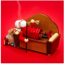 SIKORA Weihnachtsmann auf dem Sofa