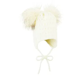 Sterntaler Strickmütze Pompons Beige/Weiß 41 cm
