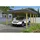SKANHOLZ Spreewald Walmdach Carport aus Nadelholz 3,96 x 5,89 m imprägniert schwarze Blände