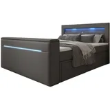 luxusbetten24 Boxspringbett Rinori mit TV Lift, USB, LED und Stauraum - 180x200 - Grau - H4 (100kg+) - Luxusbetten24 - 2 Jahre Gewährleistung - mind. 14 Tage Rückgaberecht - Grau - 180x200