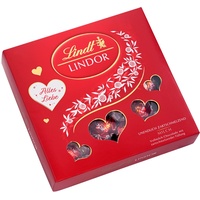 Lindt LINDOR Präsent mit Herz Cutouts, feinste Vollmilch Schokolade mit unendlich zartschmelzender Füllung, 1er Pack (1 x 187 g)