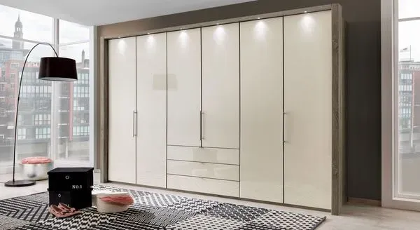 Falttürenschrank Tiko mit Schubladen Beleuchtung und Glasfront H:216cm/B:300cm/T:58cm Soft-Close modern