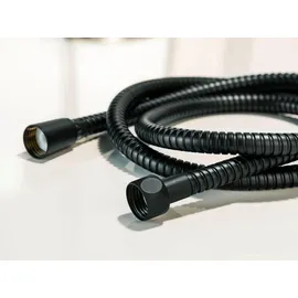 Wenko Duschschlauch 150 cm, Brauseschlauch ummantelt mit rostfreiem Edelstahl, passt an alle Duschköpfe dank 1/2" Standardanschluss, praktischer Verdrehschutz, trinkwasserzugelassen, Schwarz,