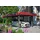 SKANHOLZ Wendland Einzelcarport 3,62 x 8,70 m schiefergrau mit EPDM-Dach und roter Blende
