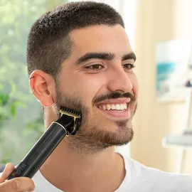 InnovaGoods Wiederaufladbarer Haarschneider T-Form, 3 Geschwindigkeiten, LCD-Display, Inkl. 6 Kämme & USB-C, Wasserdicht, Schwarz Golden, Kunststoff