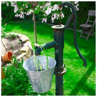 Wallario Möbelfolie Wasserquelle im Garten grün|schwarz