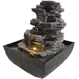 DRULINE Zimmerbrunnen mit LED - Zimmer Wasserfall Brunnen - Kaskadenbrunnen - Zimmerbrunnen - Polyresin Stein Optik - B/H/T ca. 13,5 x 18 x 13,5 cm - Grau/Schwarz - Indoor