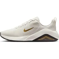 Nike Bella 7 Damen Workout-Schuh, Phantom/Metallic Gold-Black-Sail, 41