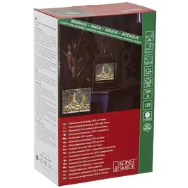 Konstsmide LED Schneelaterne mit Kirche und Weihnachtsmarkt 25 cm braun/grün/weiß