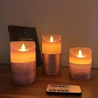Set aus 3 warmweiß flackernden violetten Kerzen mit Fernbedienung