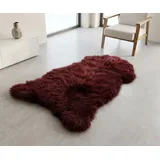 KUHFELL online & NOMAD Fellteppich Echtes großes Lammfell Schaffell Teppich in Weiß Schwarz Blau Braun, Atmungsaktiv, Temperaturausgleichend, Antibakteriell rot 110 cm