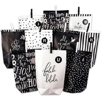 Papierdrachen Adventskalender 2025 zum Befüllen - 24 schwarze & weiße Geschenktüten mit silbernen Zahlenaufklebern und Klammern - DIY Weihnachten