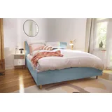 Tom Tailor HOME Polsterbett »CALIFORNIA BED«, mit seitlichen Holzakzenten am Kopfteil blau