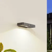 LUCANDE LED-Solar-Wandleuchte Tavon, eckig, schwarz, Sensor