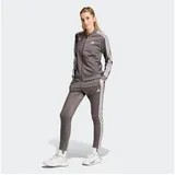 adidas Damen Sportanzug Essentials 3-Streifen, CHACOA/WHITE, M