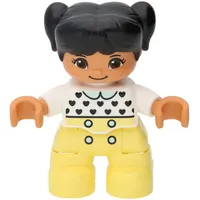 LEGO Duplo: Mädchen mit blassgelber Hose und weißem Oberteil
