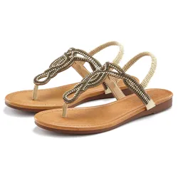 Zehentrenner LASCANA, Damen, Gr. 36, beige, Obermaterial: 100% Textilmaterial. Futter: 100% Lederimitat. Decksohle: 100% Lederimitat. Laufsohle: 100% Synthetik, Glitzer, bestickt, modisch, Schuhe Sommerschuh Zehenstegsandale, Sandale, Pantolette mit Schmucksteinen in Glitzer-Optik VEGAN