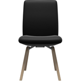 Polsterstuhl STRESSLESS "Laurel", schwarz (schwarz batick, walnuss), B:49cm H:92cm T:59cm, Leder BATICK: BATICK ist ein leicht korrigiertes, durchgefärbtes und genarbtes Möbelleder, bei dem die meisten Unebenheiten und Spuren in der Regel entfernt wurden., Stühle, Polsterstuhl, Low Back, Größe L, mit schräggestellten Beinen in Walnuss