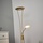 LINDBY LED-Deckenfluter Eda mit Dimmer, messing