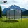 Kinetic Sports Salto Plus 244 cm inkl. Sicherheitsnetz, Regenplane und Leiter Grün