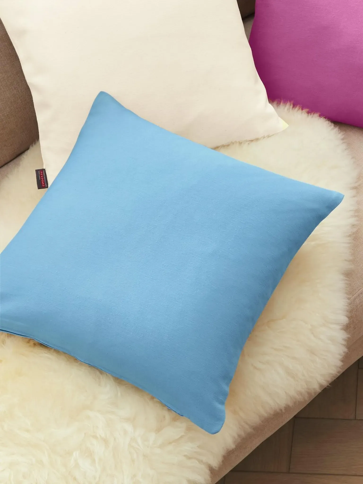 La housse coussin  Hossner bleu