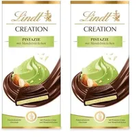 Lindt Schokolade Creation Pistazie | 7 x 148 g Tafel | Feinste feinherbe Schokolade mit Pistazien-Crème und Mandel-Stückchen | Schokoladentafel | Schokoladengeschenk (Packung mit 2)