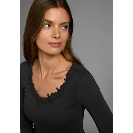 AJC Langarmshirt AJC, Damen, Gr. 36/38 (S), schwarz, Rippware, Obermaterial: 100% Baumwolle. Spitze: 100% Polyester, clean, unifarben, sehr figurbetont hüftlang, tiefer V-Ausschnitt, Shirts Langarmshirt, Langarm, figurbetont, mit zauberhafter Spitze