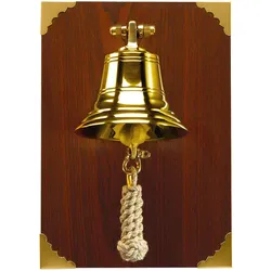 Glocke auf Holzbrett