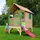 Axi Spielhaus Tom braun mit Rutsche rosa