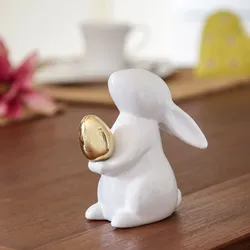 Hase mit goldenem Ei - Osterhase - Dekofigur - H: 13cm - Dolomit - weiß