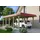 SKANHOLZ Walmdach Carport aus Nadelholz 3,96 x 7,41 m rote Blende