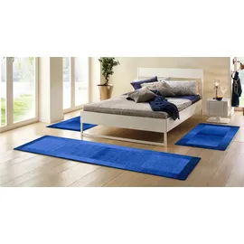 THEKO Bettumrandung THEKO "Gabbeh Super, Handweb, Teppich, Bordüre, reine Wolle" Gr. 14, blau (dunkelblau), H:9mm, Obermaterial: 100% Wolle, Bettumrandungen, Bettvorleger, Schlafzimmer, Läufer-Set