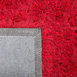 Beliani Zottelteppich CIDE Rot 80 x 150 cm