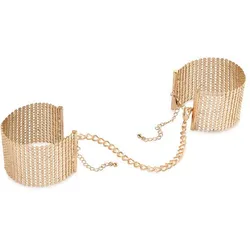 Bdsm handschellen aus metall mit goldenen maschen