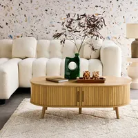 Sweeek Skandinavischer Couchtisch mit geriffeltm Holzlook und 2 Schiebetüren