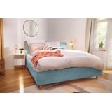 Tom Tailor HOME Polsterbett »CALIFORNIA BED«, mit seitlichen Holzakzenten am Kopfteil blau