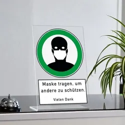 Acrylaufsteller "Maske tragen, um andere zu schützen" (ca. 200x300 mm)