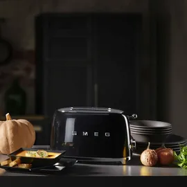 Smeg TSF01BLEU Schwarz / Hochglanz