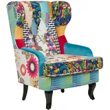 Sessel Patchwork bunt blau Ohrensessel mit schwarzen Holzbeinen Retro-Stil Molde