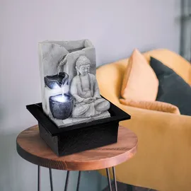 GLOBO Tischbrunnen mit Pumpe Springbrunnen mit LED Beleuchtung Buddha Design Zimmerbrunnen grau Dekoration, LxBxH 21x18,5x25,5 cm