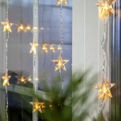 LED Lichtervorhang 30 leuchtende Sterne 90x120cm mit Trafo für Innen Fensterdeko