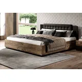 Doppelbett Bett Sigma mit Polsterung Ausführung 180cm mit Lattenrost Flagstaf Eiche dunkel - silber App. / schwarz - Braun/Schwarz/Silber