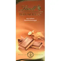 Lindt Schokolade Edel-Nougat | 10 x 100g Tafel | Vollmilch-Schokolade mit zartem Haselnuss-Nougat | Schokoladentafel | Schokoladengeschenk